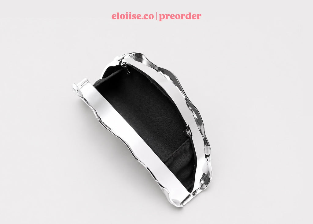 Curva Clutch | Sculptural Marble Signature