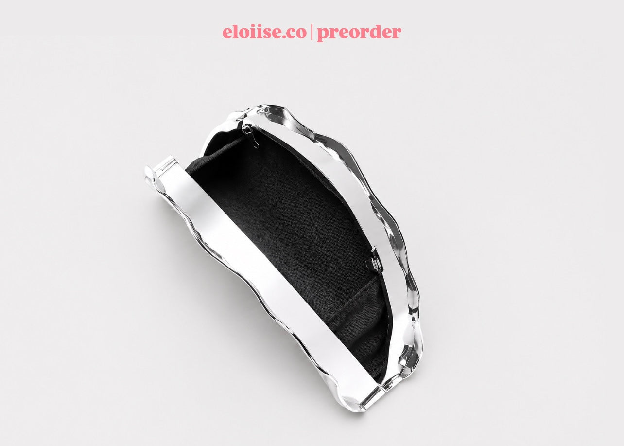 Curva Clutch | Sculptural Marble Signature