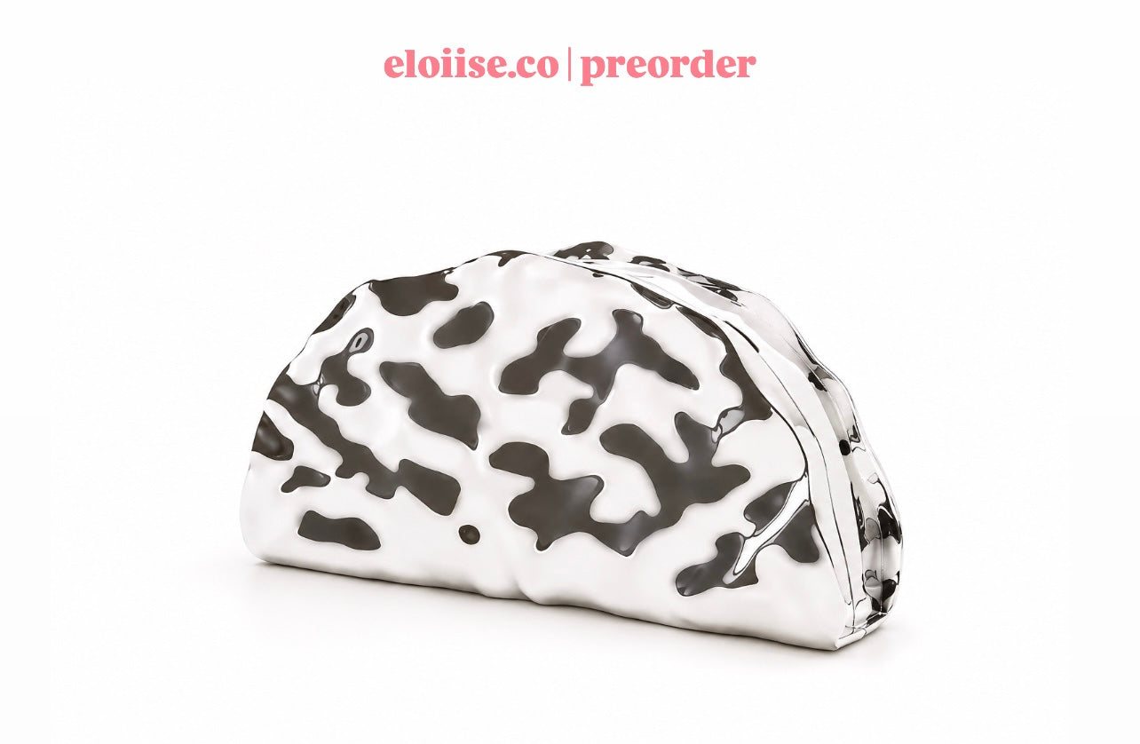 Curva Clutch | Sculptural Marble Signature